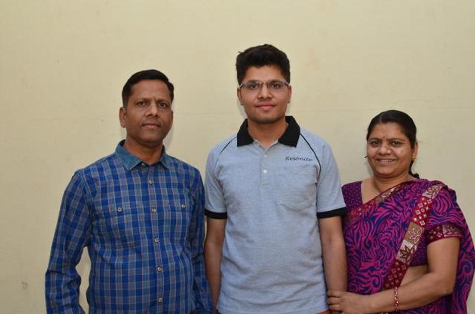 Kalpit with his parents.