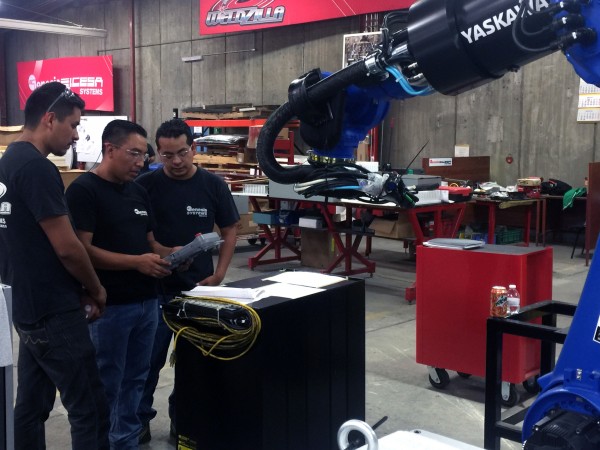 René Sánchez runs a Yaskawa robot
