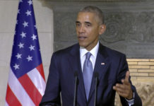 Obama Signs Defense Policy Bill, Objects on Guantanamo obama