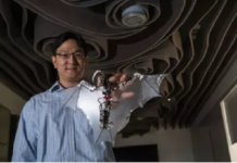 Caltech Engineers Develop Robotic Bats Soon-Jo Chung, associate professor of aerospace and Bren Scholar at Caltech, holds the Bat Bot.