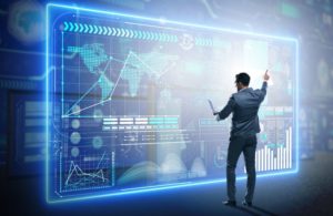 Businessman searching for big data Businessman searching for big data