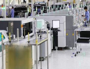 Ericsson Nanjng factory - engineers on factory floor Ericsson Nanjng factory - engineers on factory floor